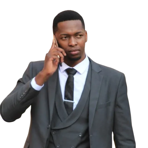 Farai Chimbwedza Taking a phone call wearing a suit.